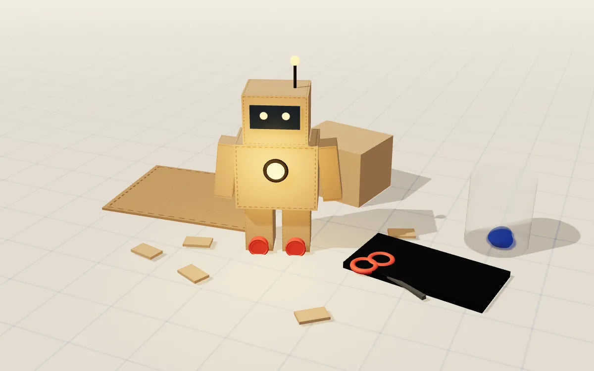 Después: la misma mesa con un robot de cartón terminado y el LED encendido